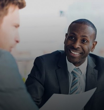 Two professionals in a business meeting